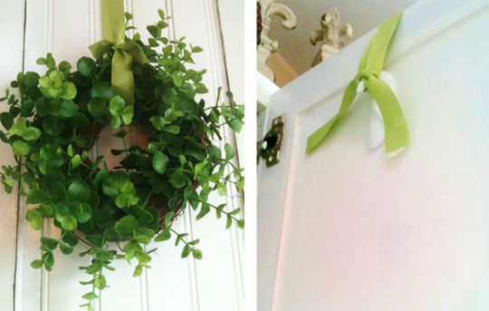 http://www.apartmenttherapy.com/hang-a-wreath-on-a-cabinet-doo-161712