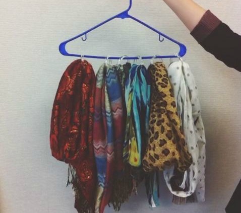 Use shower rings and a hanger to create a scarf organizer