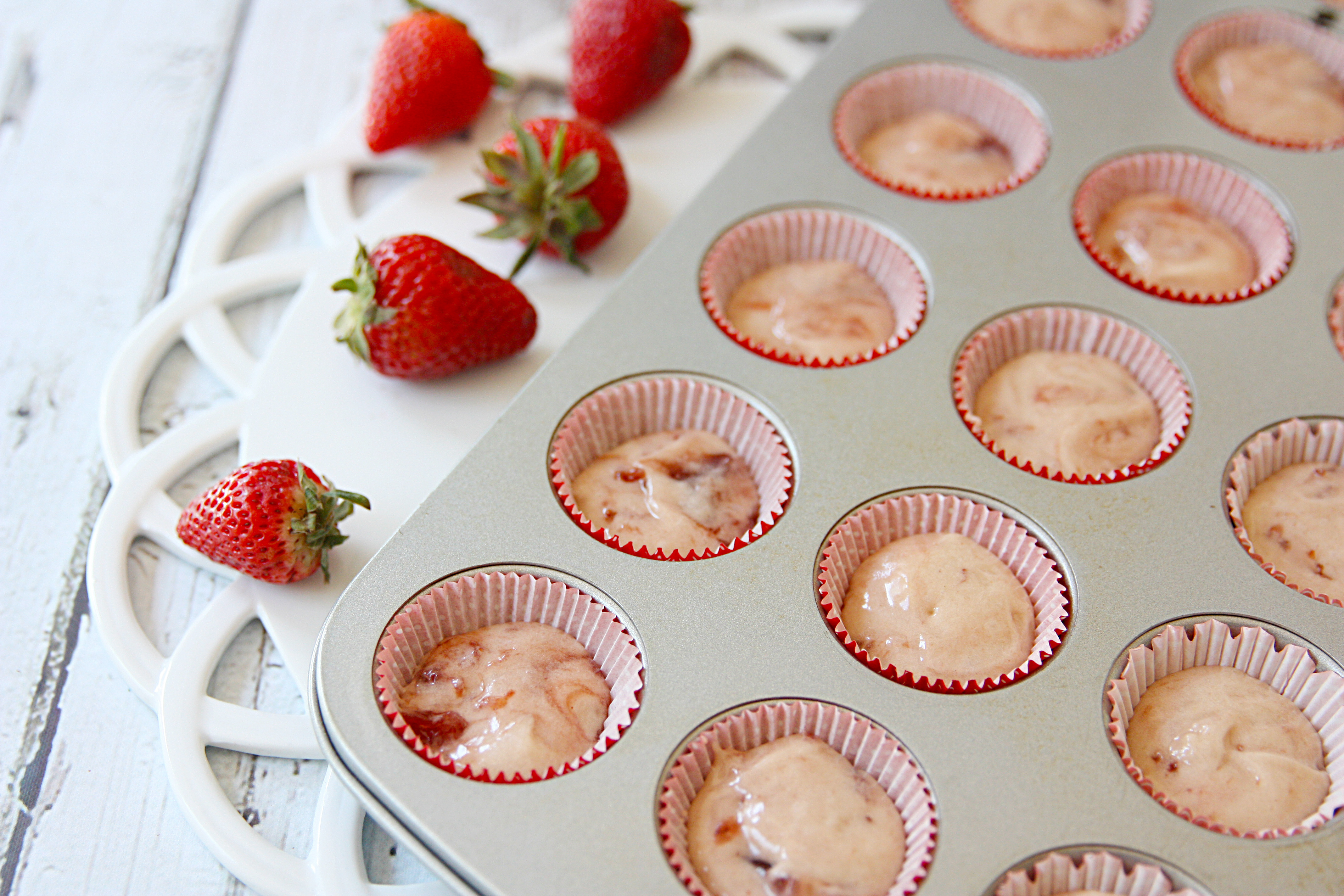 Evenly pour your muffin batter into the muffin tin.