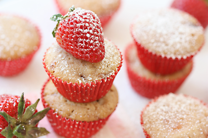 Garnish your muffins with powdered sugar and fresh strawberries!