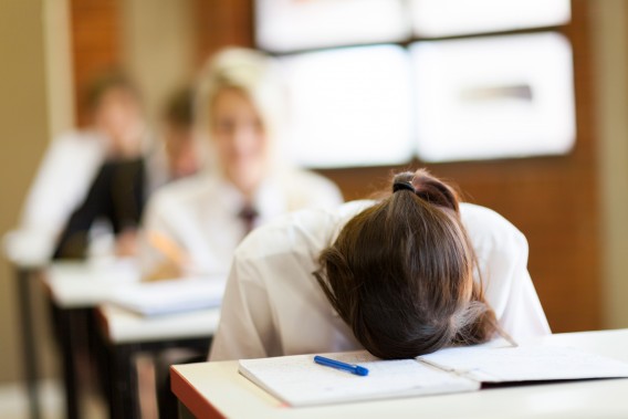 frustrated high school student in classroom