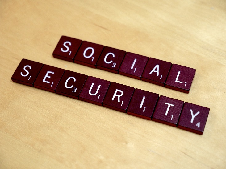 Letter blocks spelling out Social Security, for an article on early retirement mistakes.