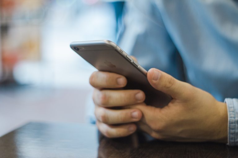 Male on mobile phone