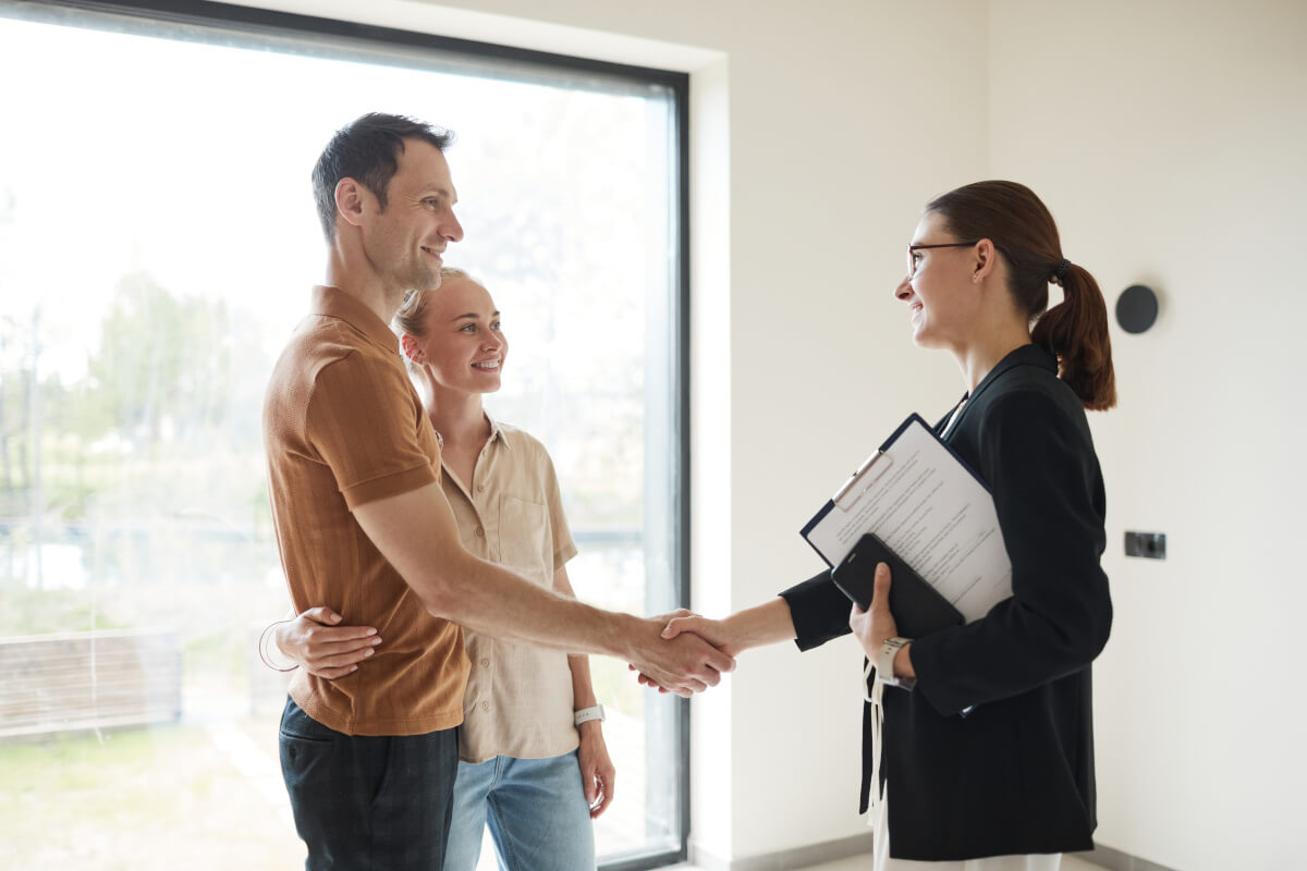 Landlord and tenants shake hands