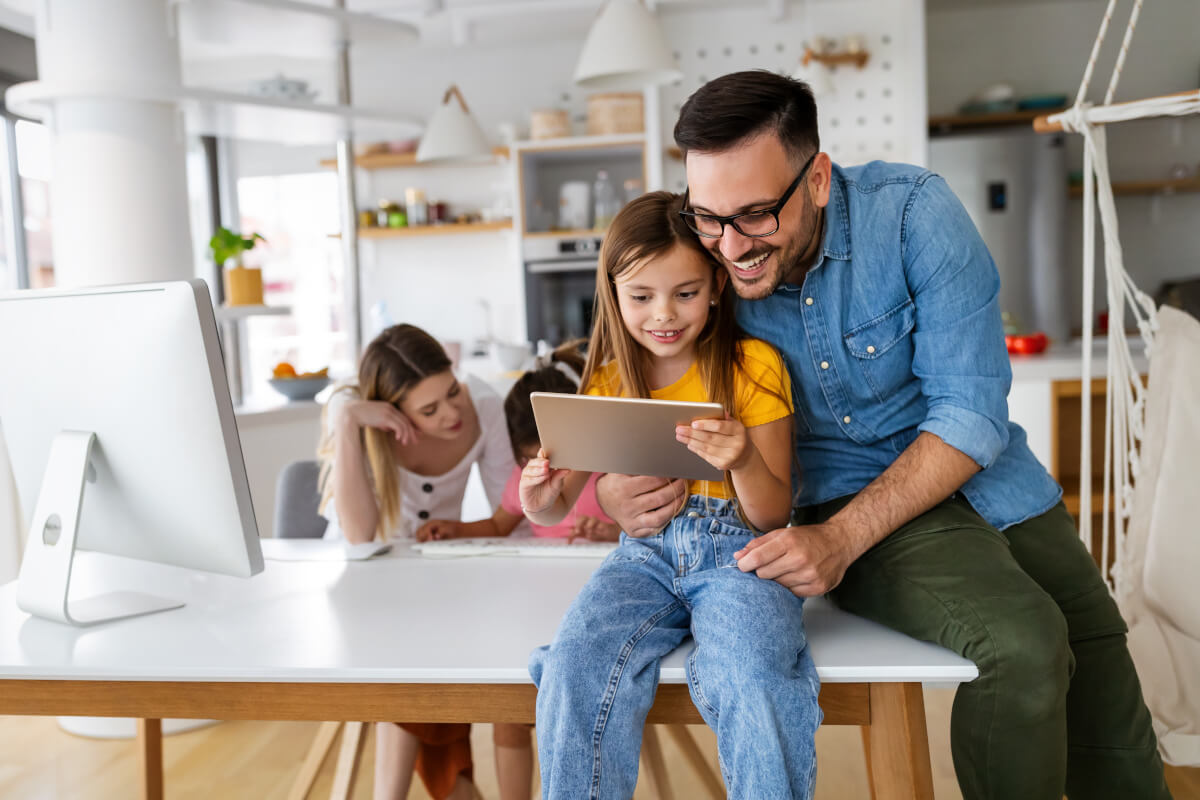 Family uses smart technology in their apartment.